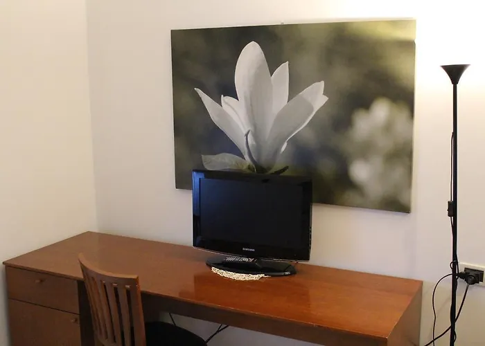 فندق Riverside 4*